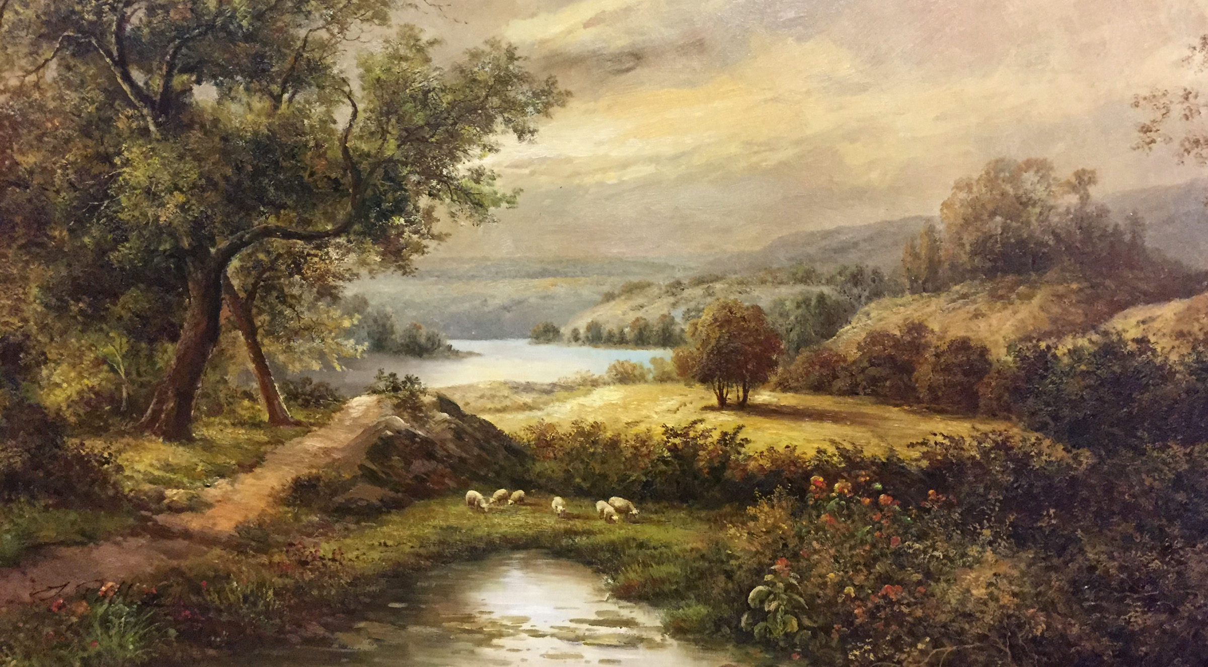 Painting of people on horses with a pack of beagles probably fox hunting. This is meant to illustrate the firm's history with notable donors in the region who have given generously over the generations.